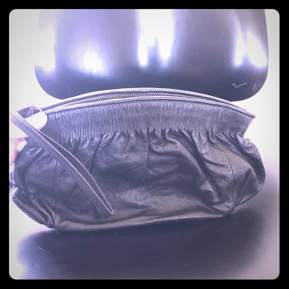 Black leather wristlet by Banana Republic